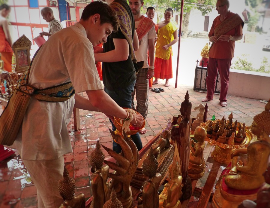 Watering the Buddha at Wat Muenna 2